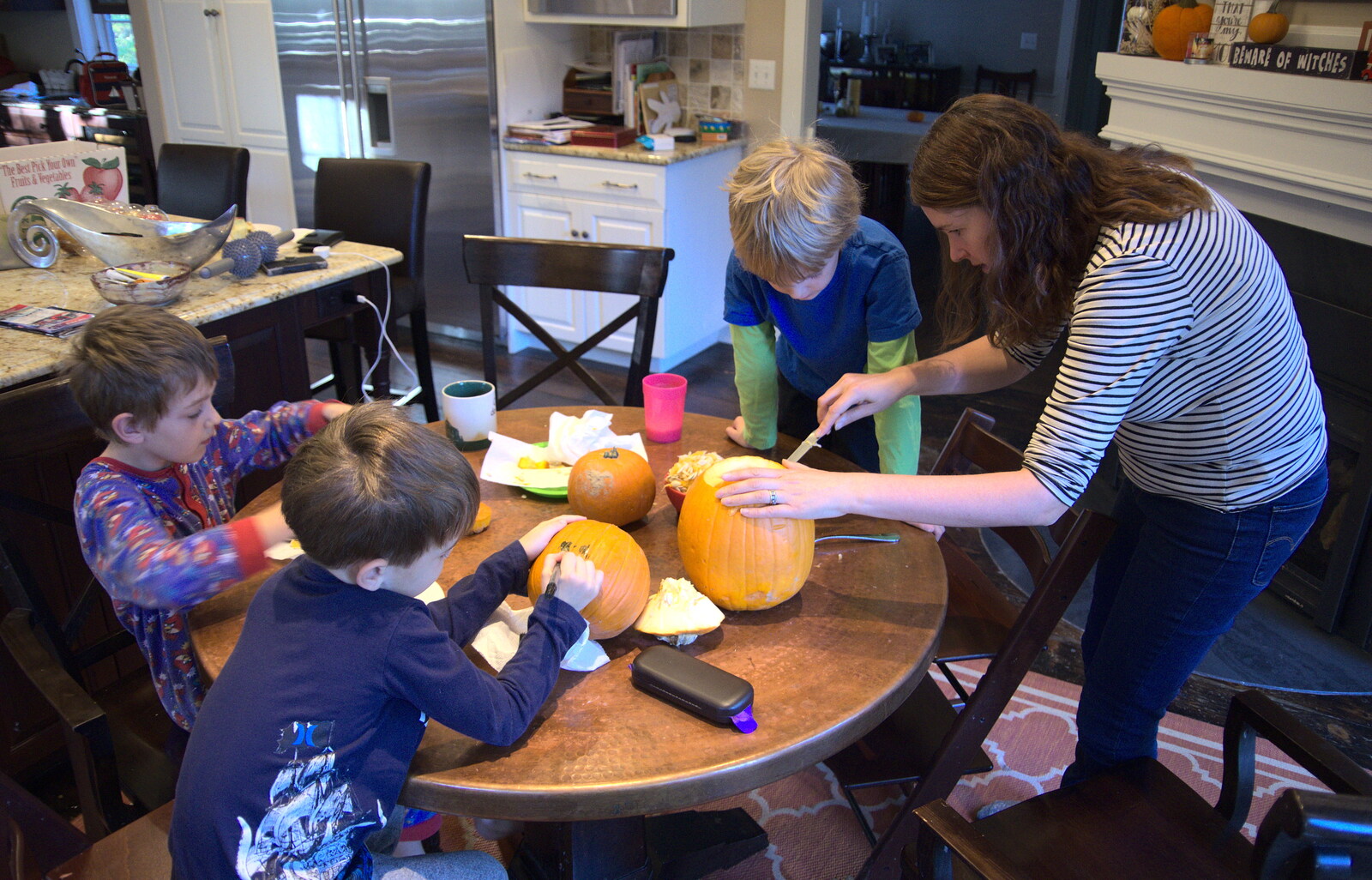 It's a family pumpkin carving session from Pumpkin Picking at Alstede Farm, Chester, Morris County, New Jersey - 24th October 2018