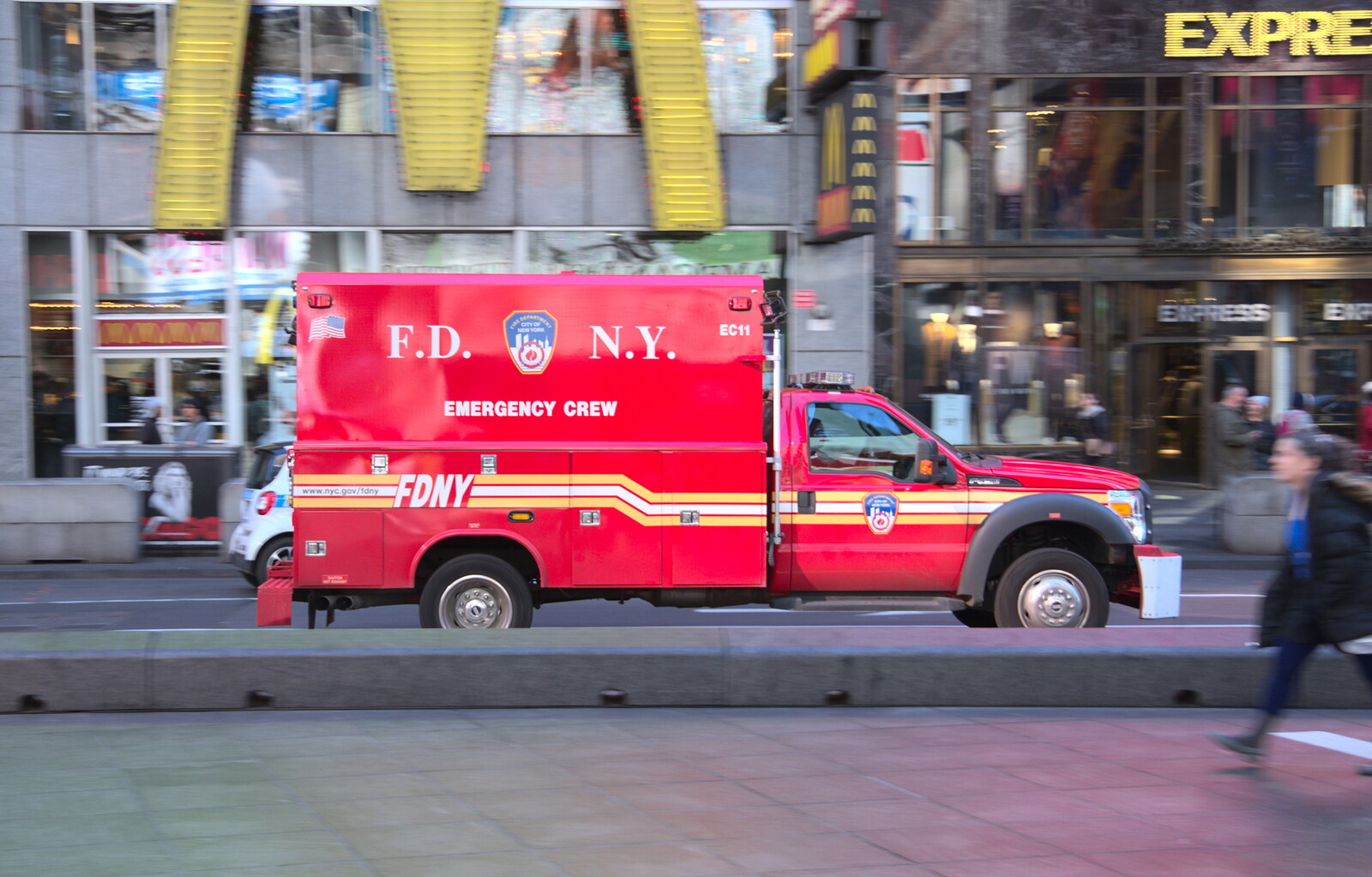 An FDNY van drives by at speed from Times Square, USS Intrepid and the High Line, Manhattan, New York - 25th October 2018