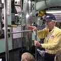 A former crewman explains the periscopes to the boys, Times Square, USS Intrepid and the High Line, Manhattan, New York - 25th October 2018