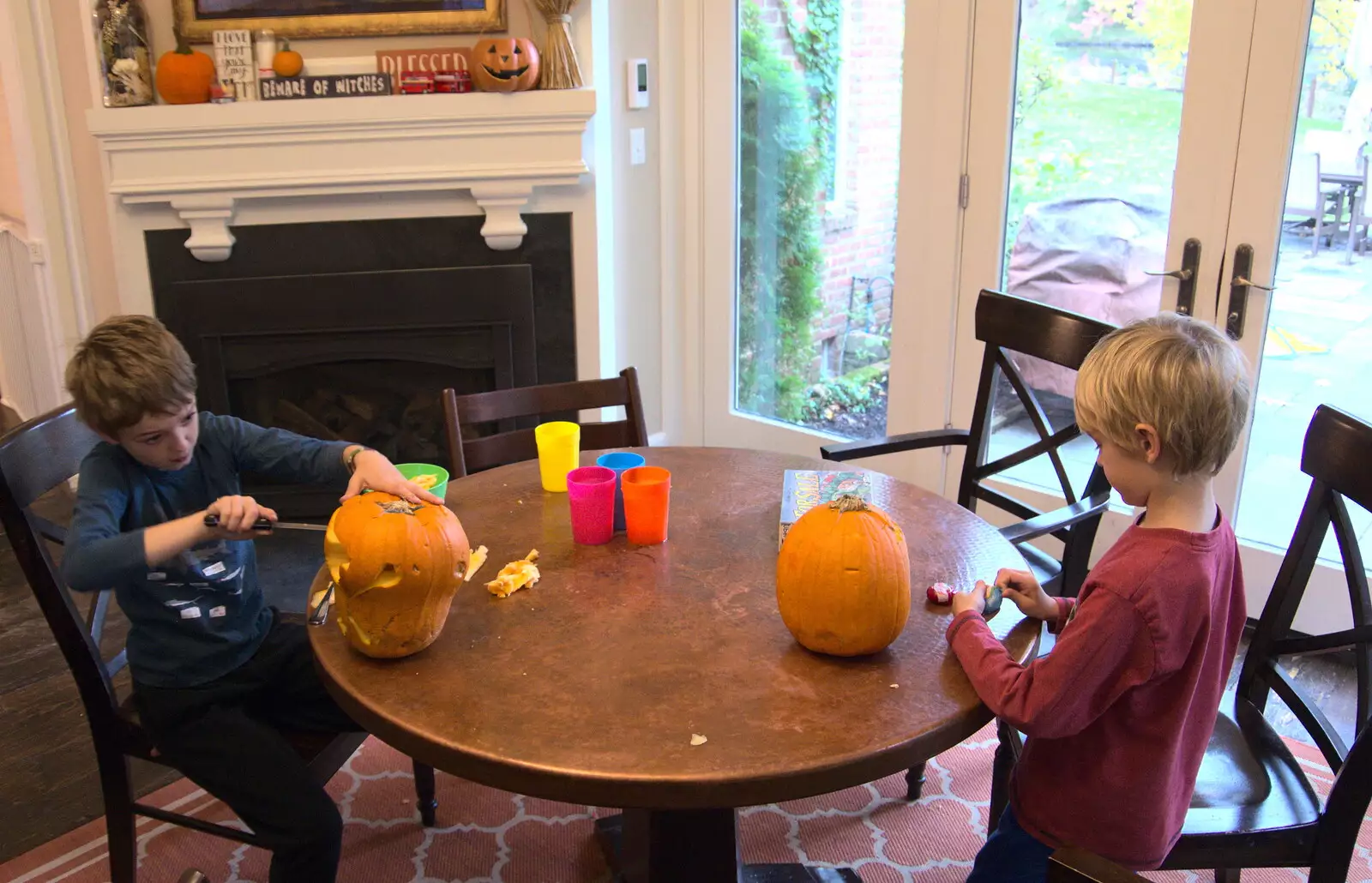 The boys carve their Alstede pumpkins, from Times Square, USS Intrepid and the High Line, Manhattan, New York - 25th October 2018