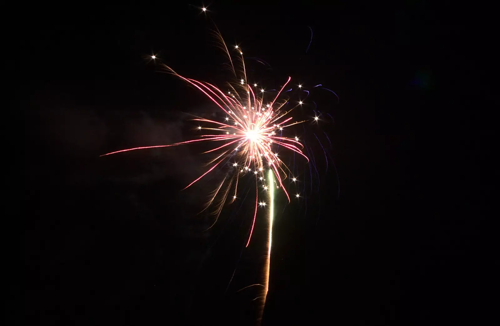 A firework throws off little stars, from Apples and Fireworks, Carleton Rode and Palgrave, Suffolk - 4th November 2018