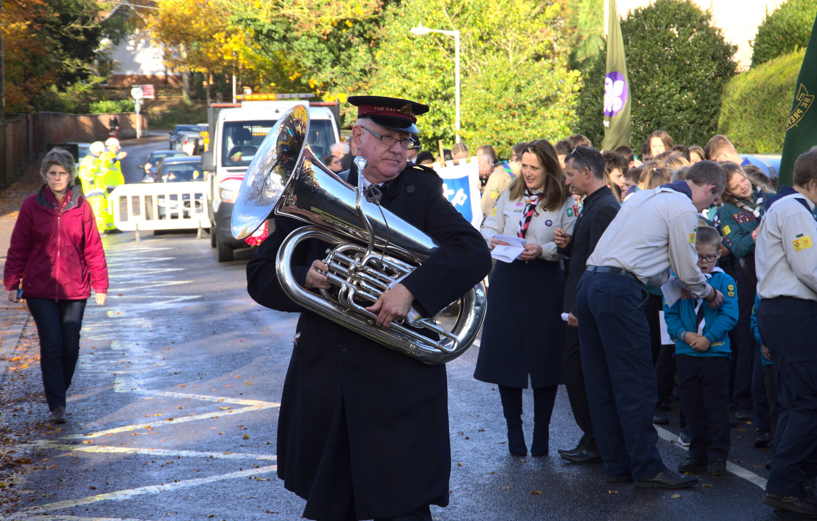A Sally Army dude hauls his tuba up Lambseth Street from The Remembrance Sunday Parade, Eye, Suffolk - 11th November 2018