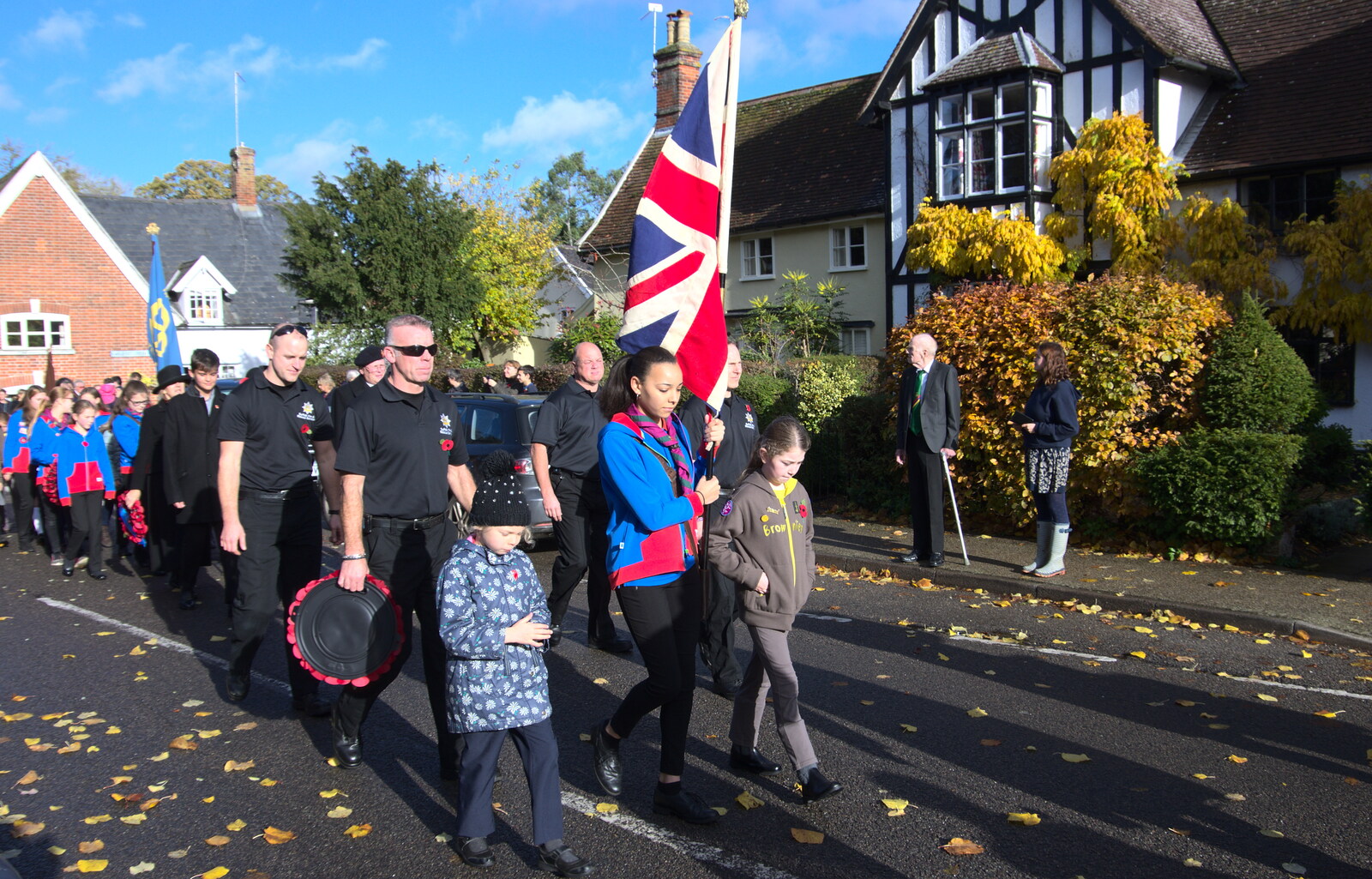 The march heads off up the road from The Remembrance Sunday Parade, Eye, Suffolk - 11th November 2018