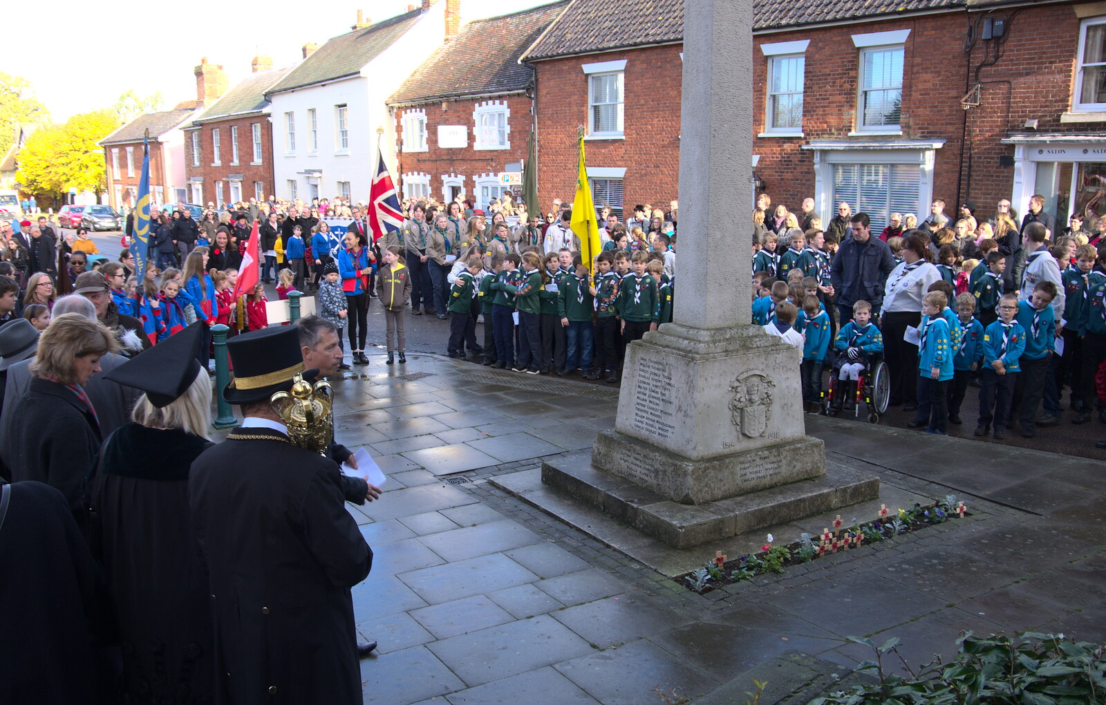 The parade is assembled around the war memorial from The Remembrance Sunday Parade, Eye, Suffolk - 11th November 2018
