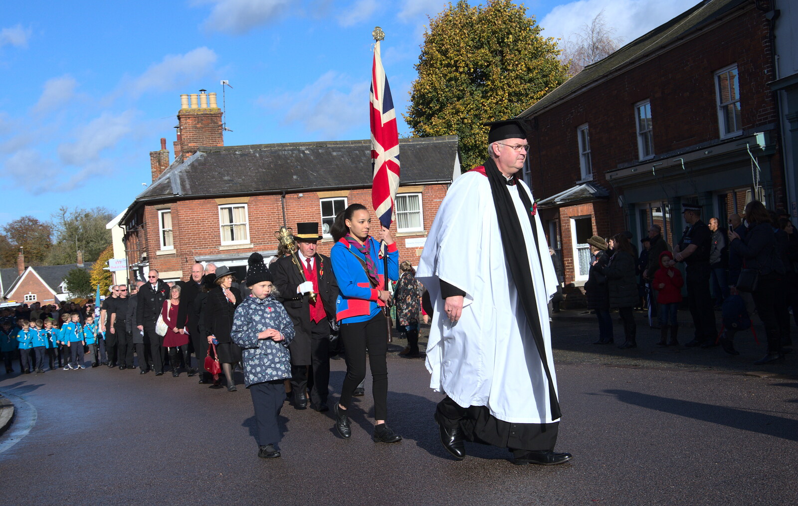The proctor heads the procession up to Church Street from The Remembrance Sunday Parade, Eye, Suffolk - 11th November 2018