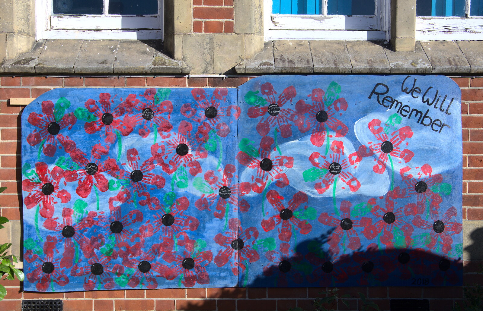 Poppies made out of school-children's hand prints from The Remembrance Sunday Parade, Eye, Suffolk - 11th November 2018