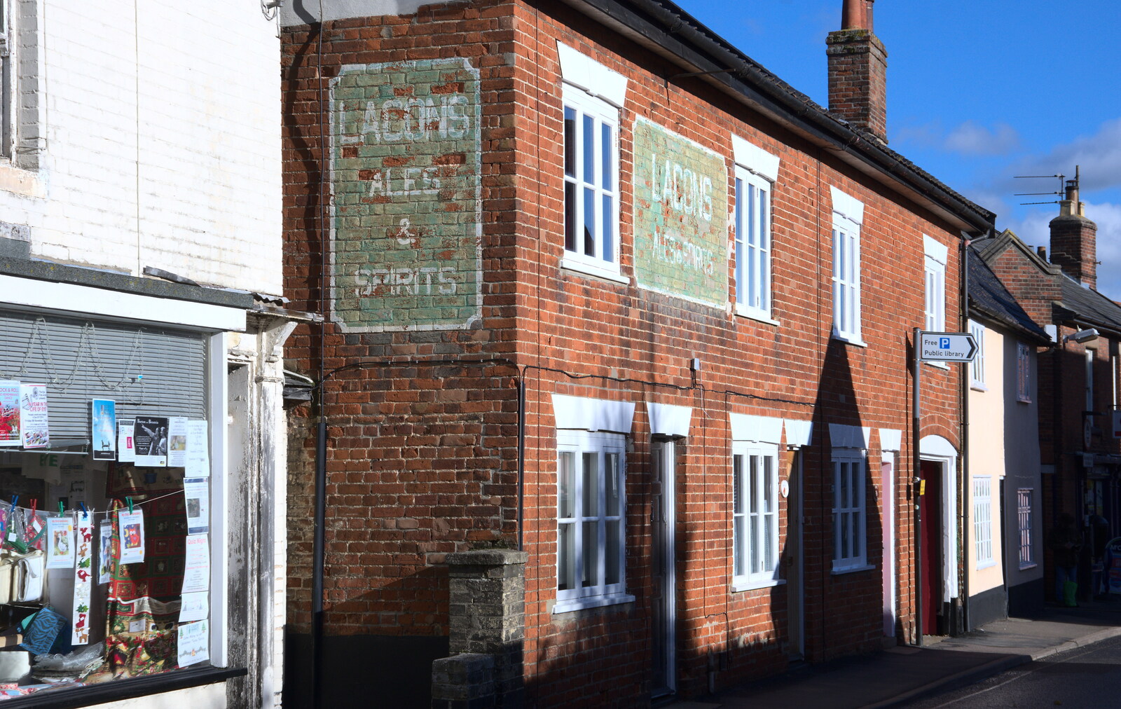 Old Lacons pub signs on a wall from The Remembrance Sunday Parade, Eye, Suffolk - 11th November 2018
