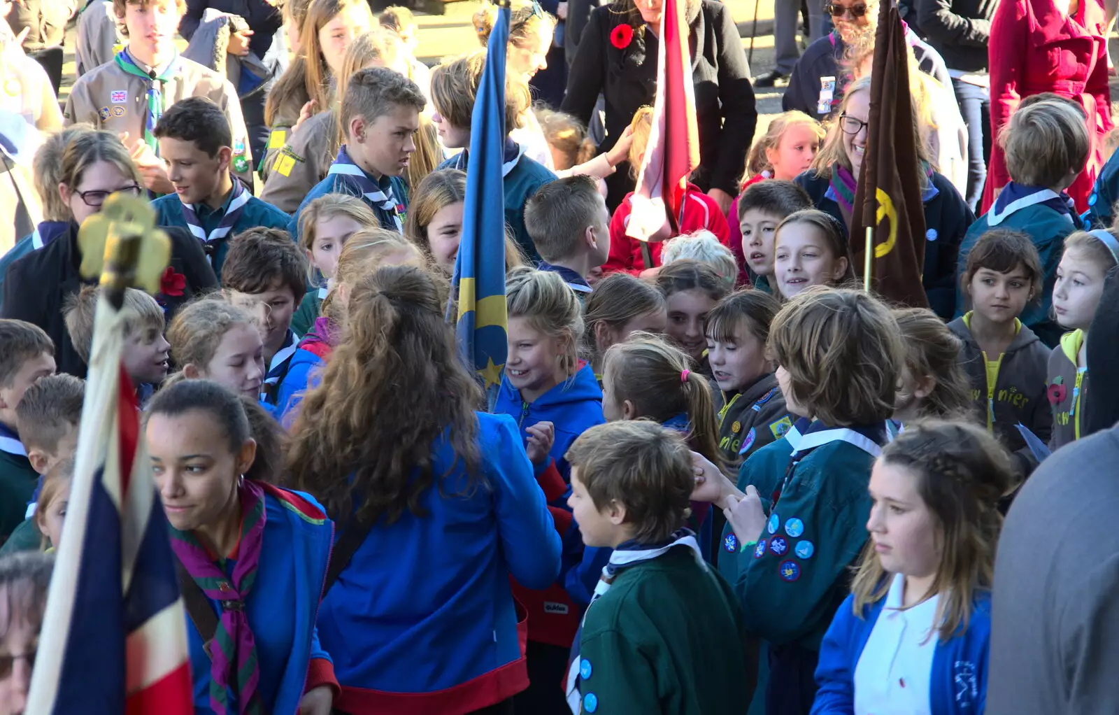 There's a feeding frenzy when sweets appear, from The Remembrance Sunday Parade, Eye, Suffolk - 11th November 2018