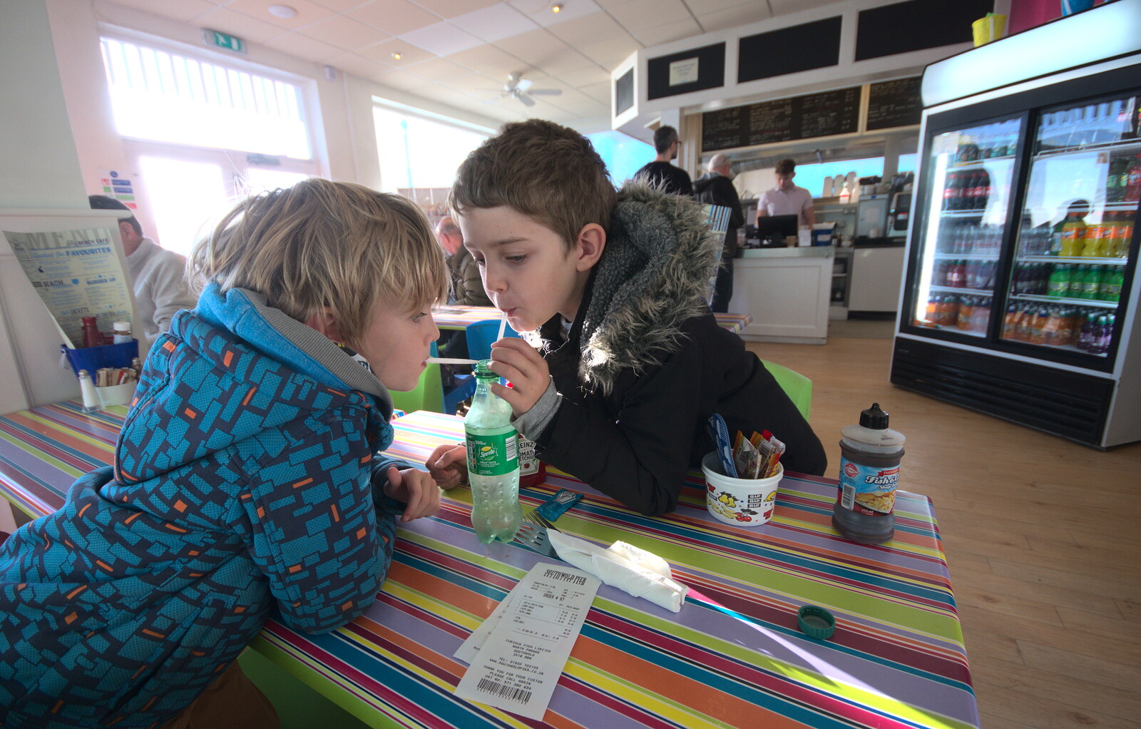 The boys share a Diet Sprite in the café from Sunset at the Beach, Southwold, Suffolk - 18th November 2018