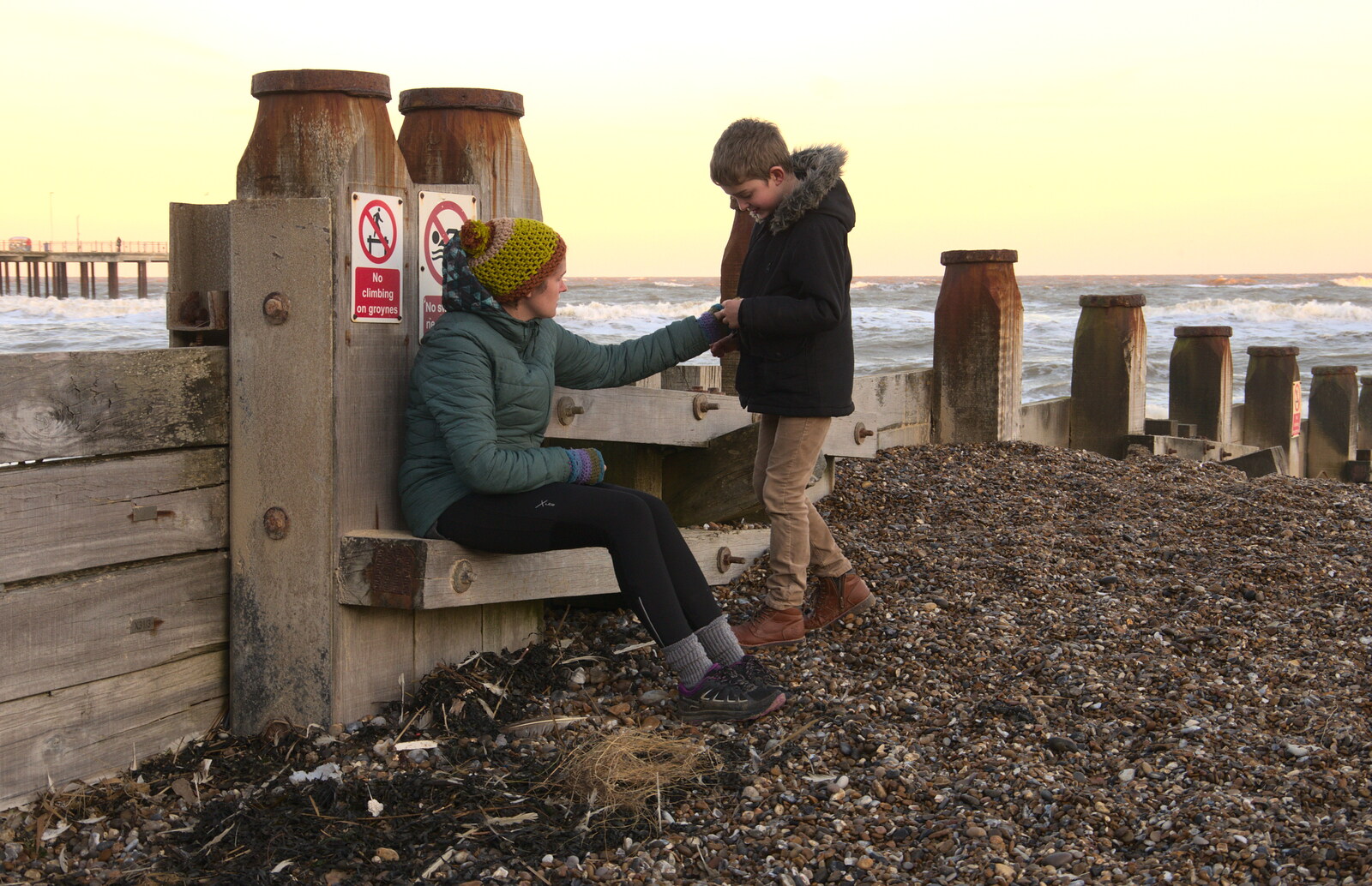 Isobel gives Fred something she's found from Sunset at the Beach, Southwold, Suffolk - 18th November 2018