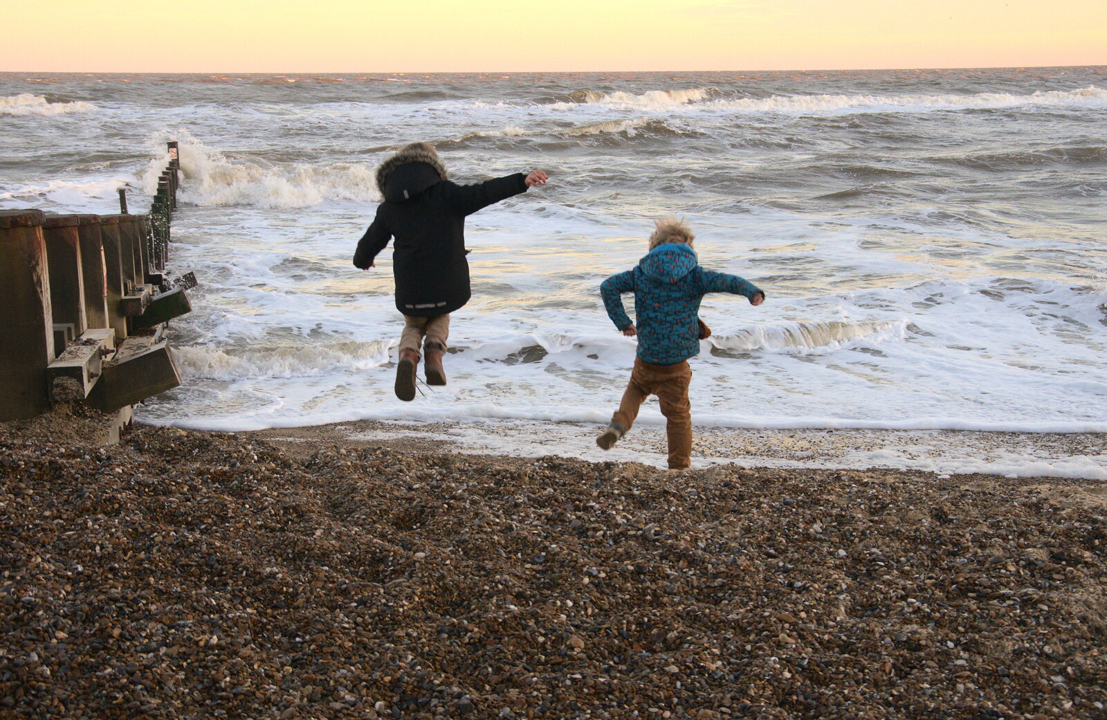 The boys leap around from Sunset at the Beach, Southwold, Suffolk - 18th November 2018