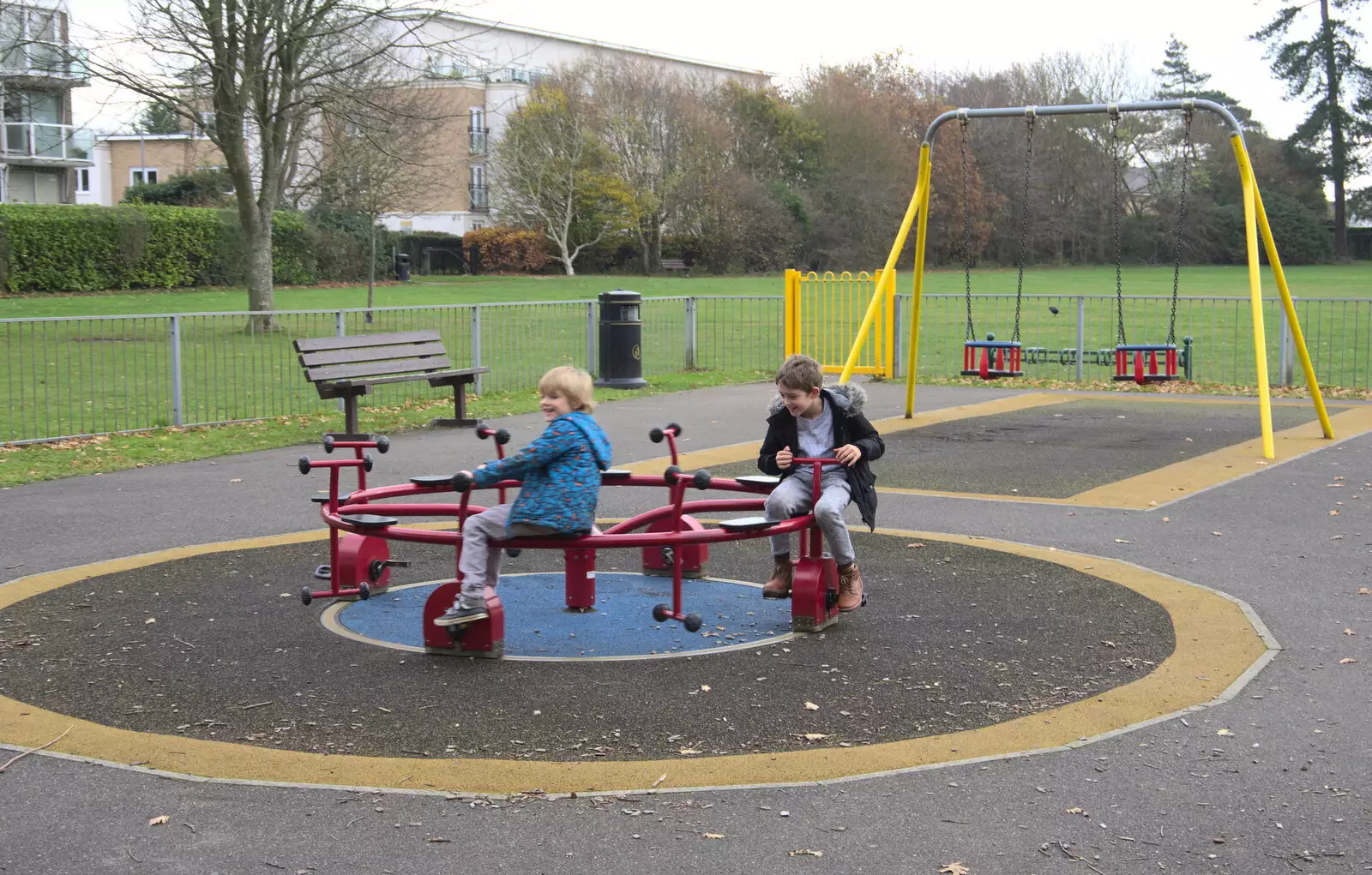 Harry and Fred on a roundabout, from Thanksgiving in Highcliffe, Dorset - 23rd November 2018