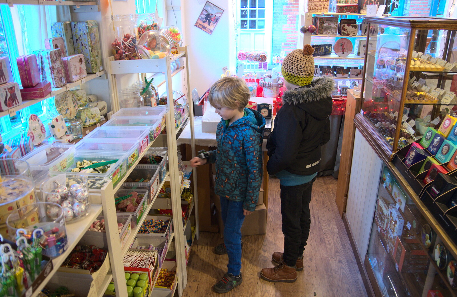 The boys roam around Claire's Sugarcraft from The St. Nicholas Street Fayre, Diss, Norfolk - 9th December 2018