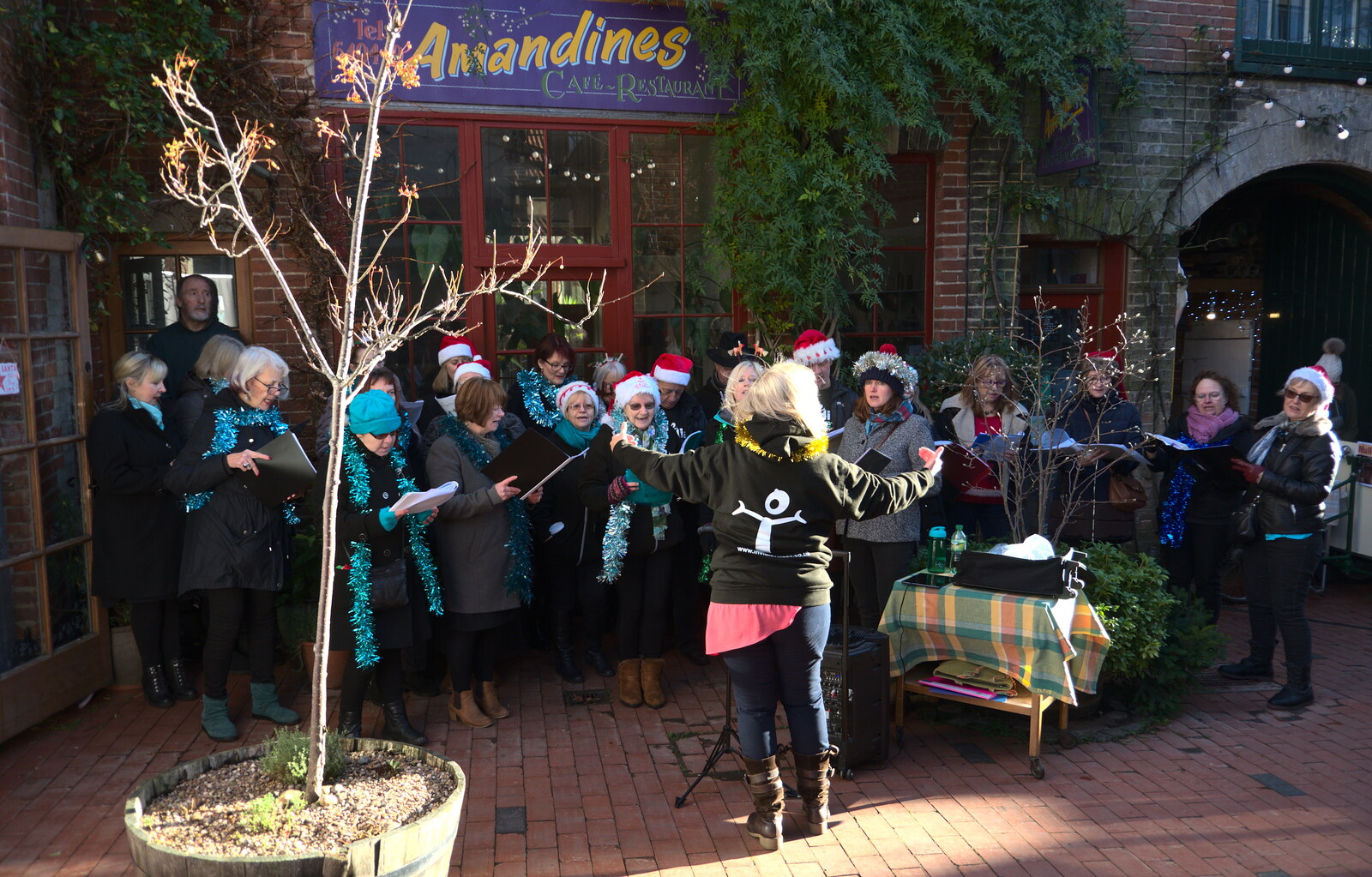 The choir does its singing thing from The St. Nicholas Street Fayre, Diss, Norfolk - 9th December 2018