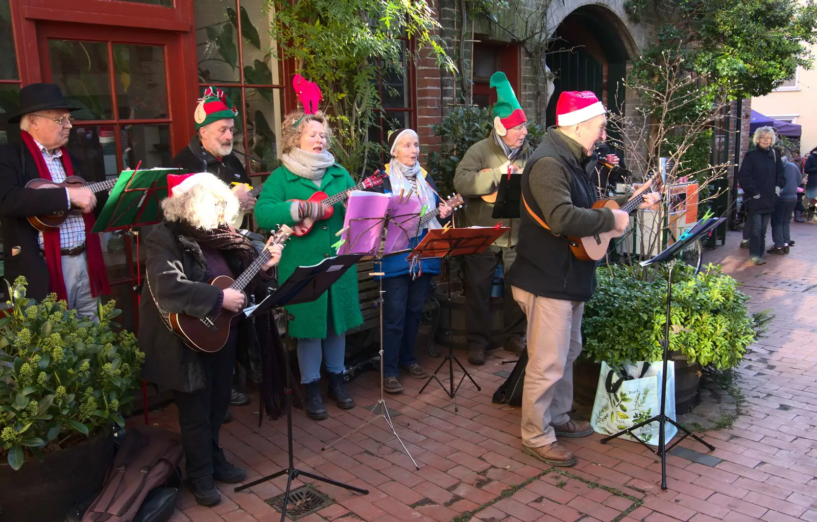 Ukulele players outside Amandine's, from The St. Nicholas Street Fayre, Diss, Norfolk - 9th December 2018