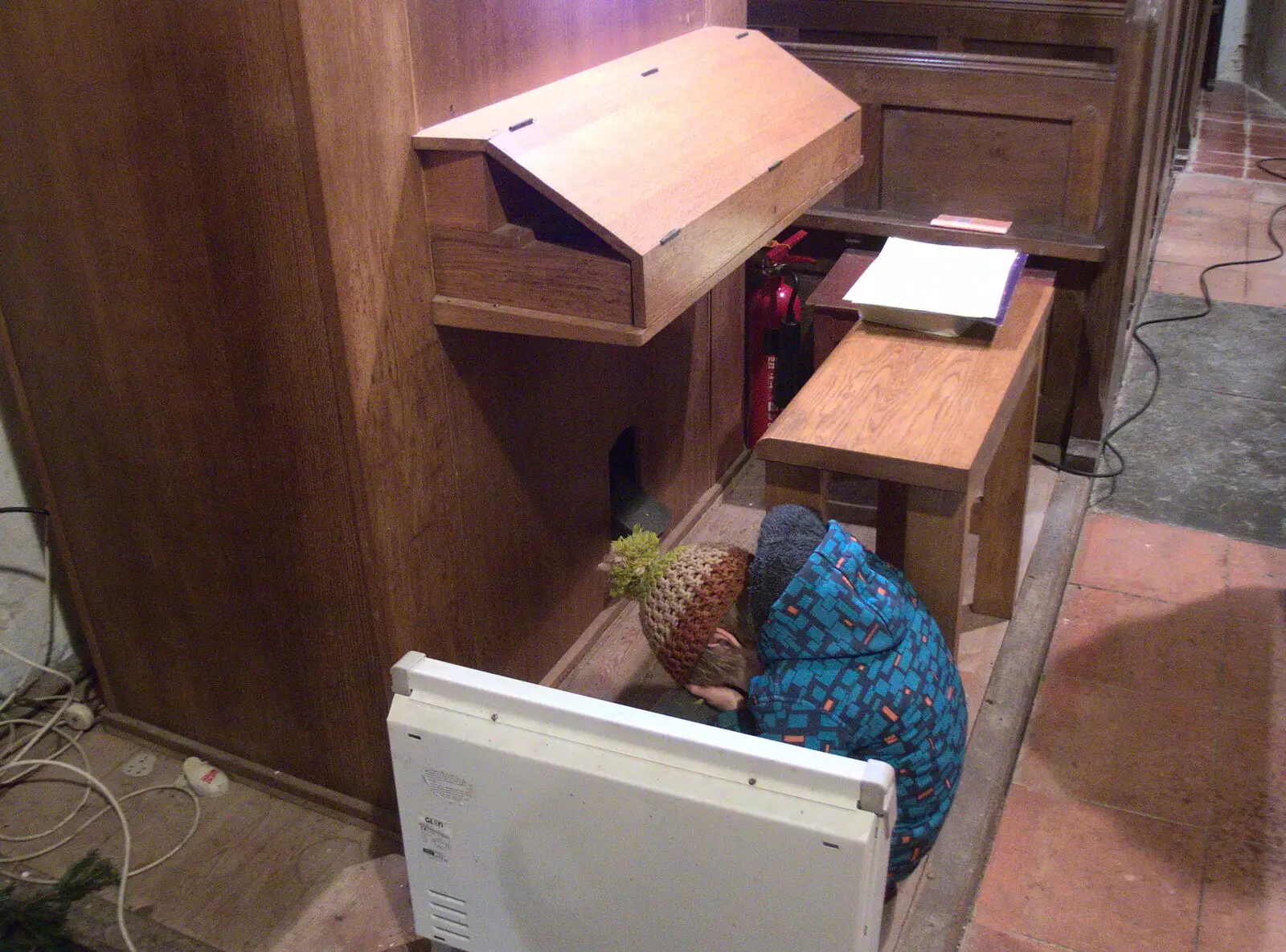 Harry's doing a not-very-well-hidden hide and seek, from Christmas Carols at St. Margaret's, Thrandeston, Suffolk - 17th December 2018