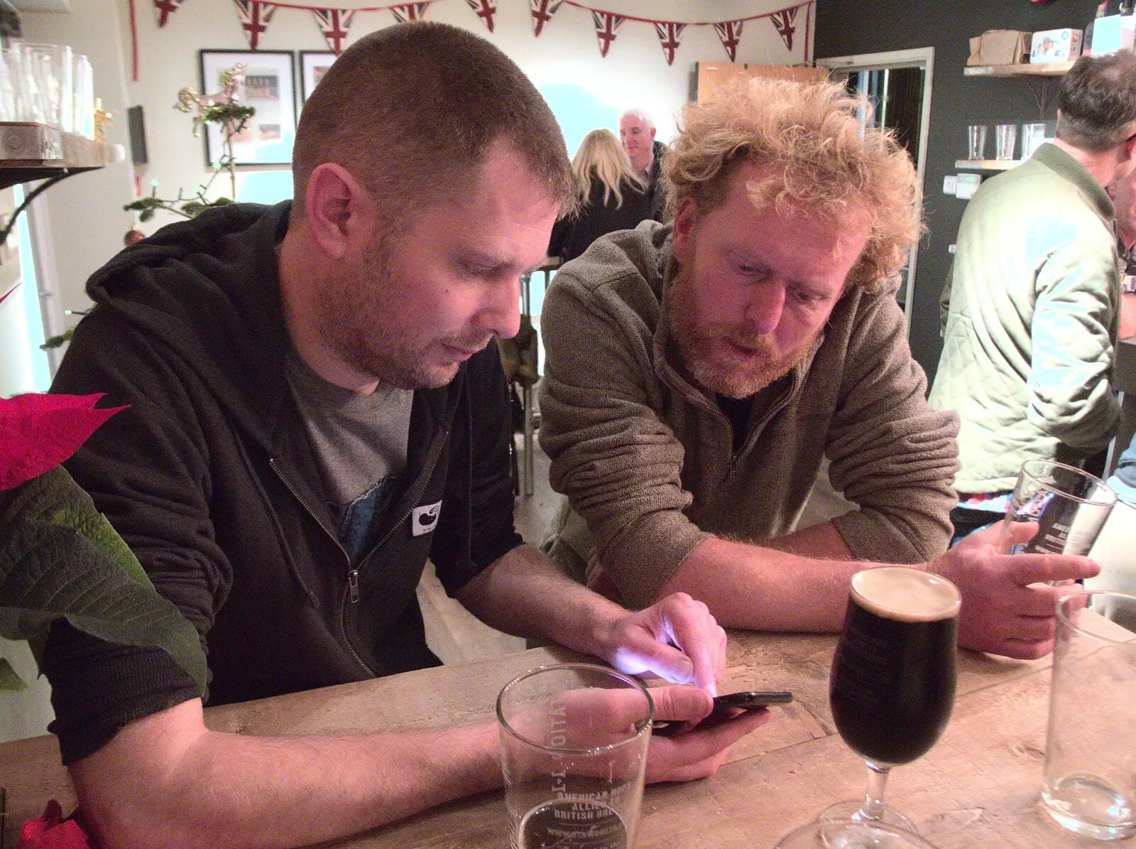 The Boy Phil shows off something on his phone, from Christmas Carols at St. Margaret's, Thrandeston, Suffolk - 17th December 2018