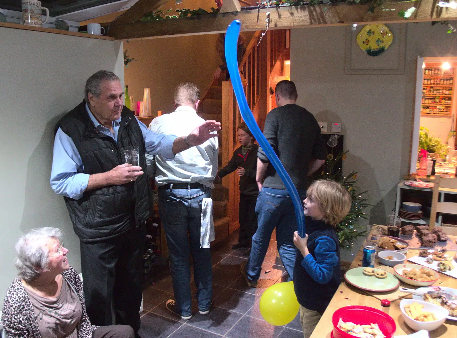 Alan fends of one of Harry's balloons, from Round Gaz and Sandie's, Eye, Suffolk - 22nd December 2018