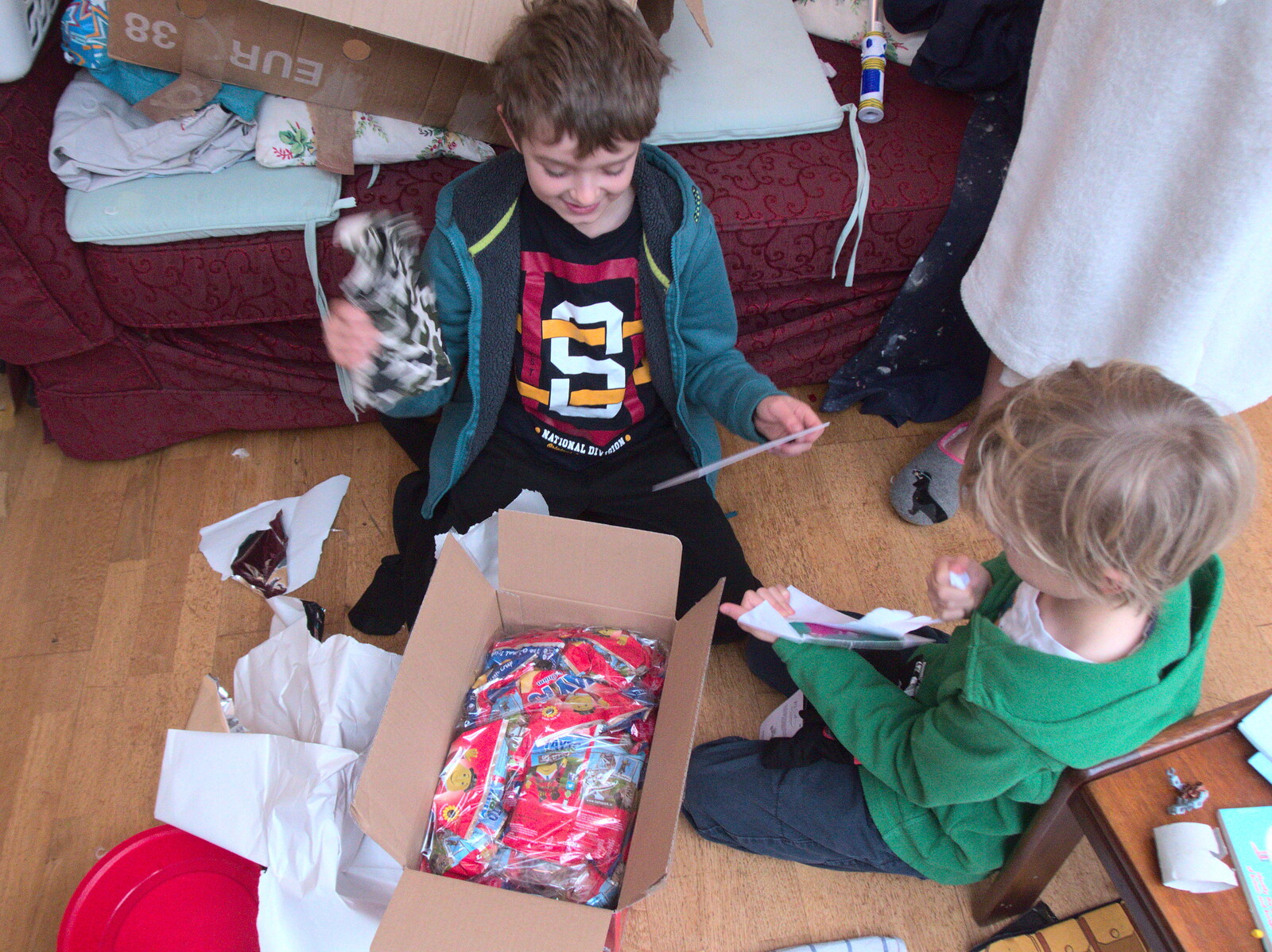 The boys get a box of Tayto from Da Gorls from Christmas at Grandma J's, Spreyton, Devon - 25th December 2018