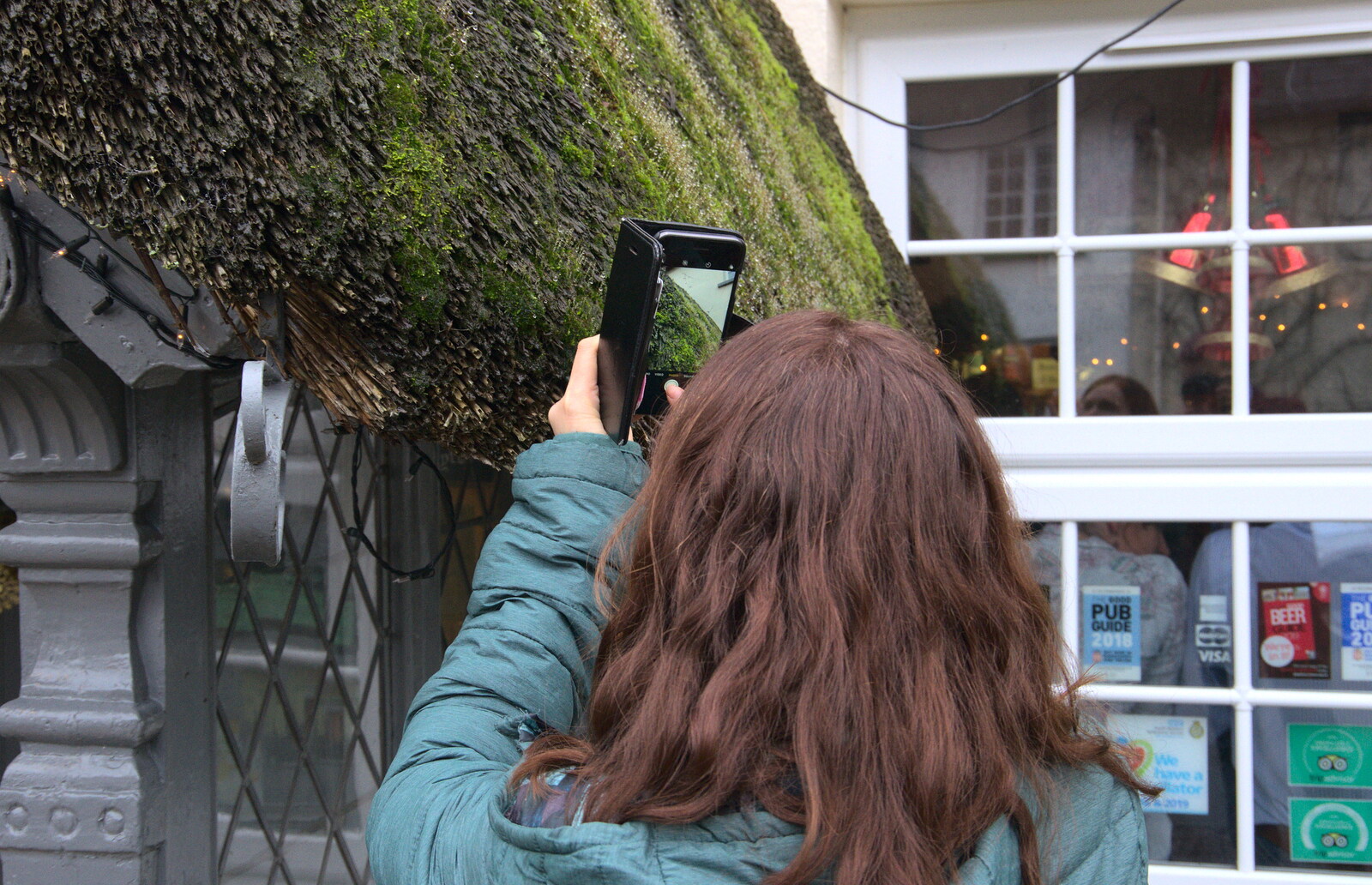 Isobel takes a photo of the moss on the porch roof from Christmas at Grandma J's, Spreyton, Devon - 25th December 2018