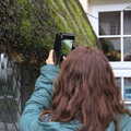 Isobel takes a photo of the moss on the porch roof, Christmas at Grandma J's, Spreyton, Devon - 25th December 2018