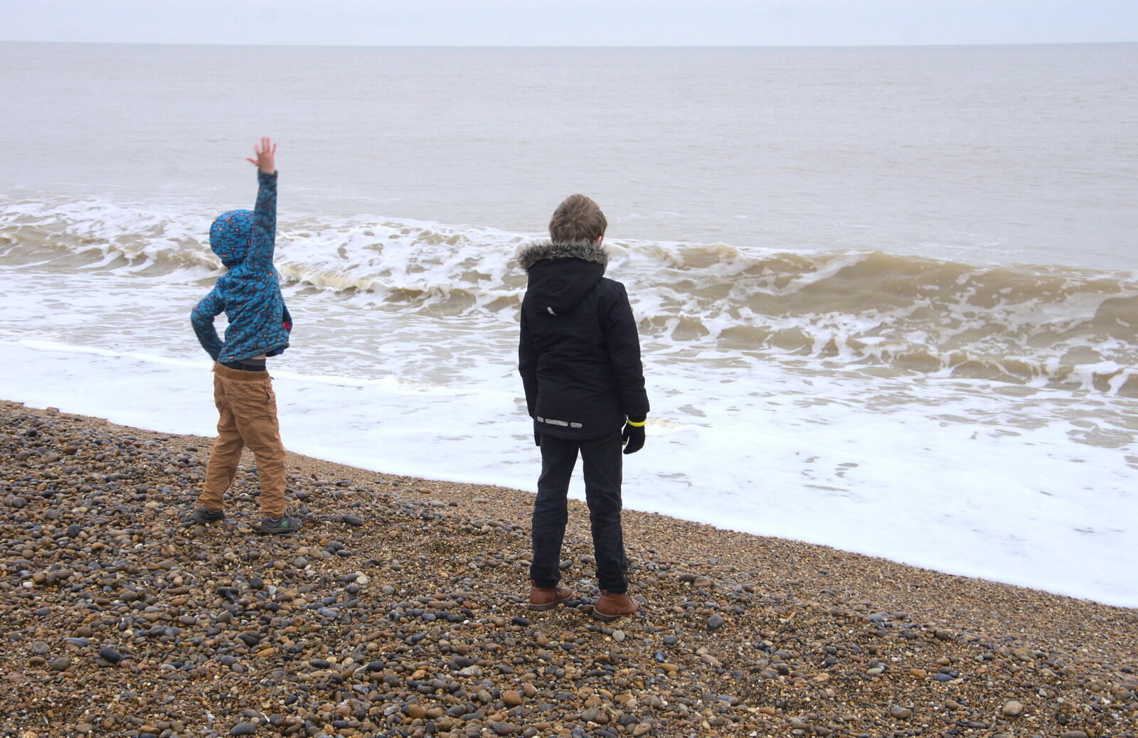 Harry flings stones at the sea from A Postcard from Aldeburgh, Suffolk - 6th January 2019