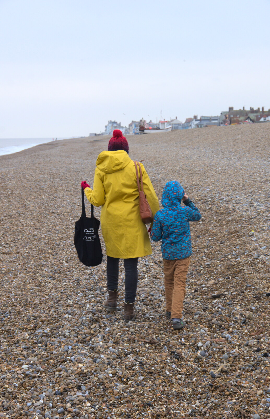 Isobel and Harry walk off from A Postcard from Aldeburgh, Suffolk - 6th January 2019