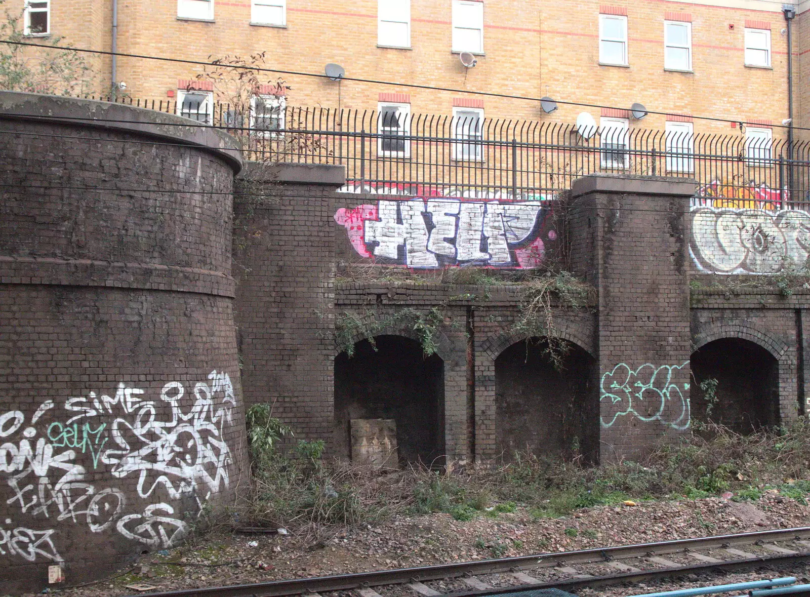 Someone has tagged the word 'help', from Railway Graffiti, Tower Hamlets, London - 12th February 2019