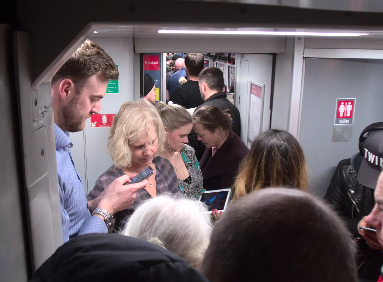 The train is packed, so it's standing room only, from Railway Graffiti, Tower Hamlets, London - 12th February 2019