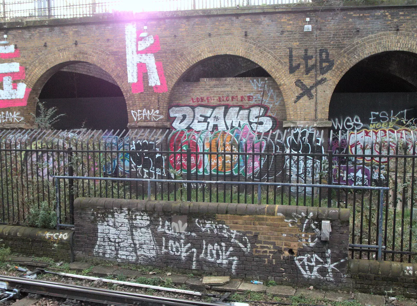 Lord Nomad and Deams tags are getting crowded out, from Railway Graffiti, Tower Hamlets, London - 12th February 2019