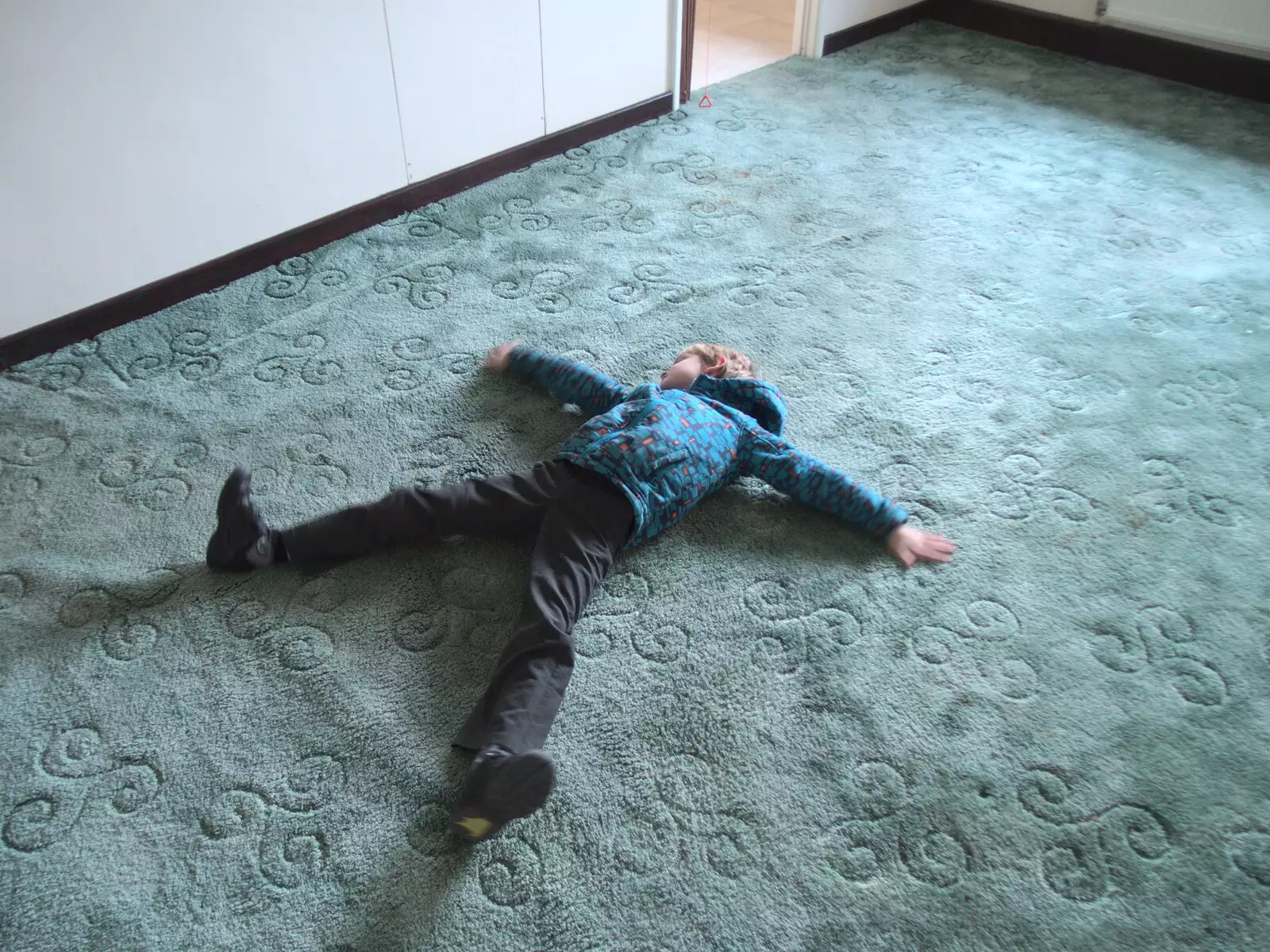 Harry does some sort of carpet angel, from The G-Unit Moves In, Eye, Suffolk - 4th March 2019