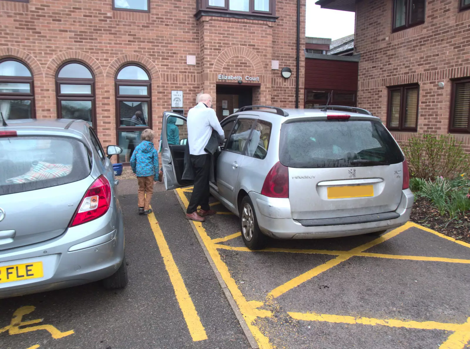 Grandad hauls stuff out of his car, from Off to the Cinema Again, Norwich, Norfolk - 9th March 2019