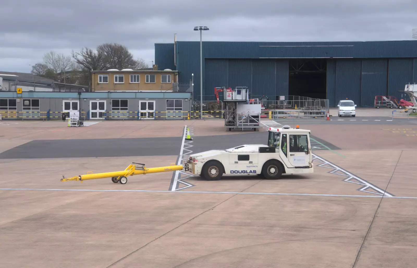 An aeroplane tug trundles around, from Devon In A Day, Exeter, Devon - 14th March 2019