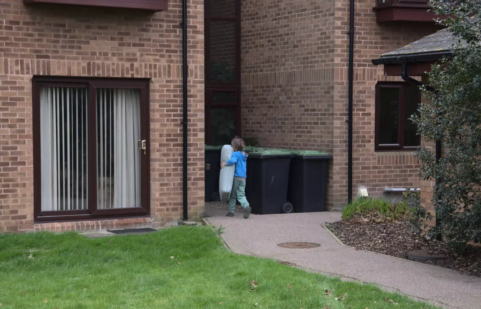 Harry clings on to a sofa cushion and hauls it inside, from Devon In A Day, Exeter, Devon - 14th March 2019