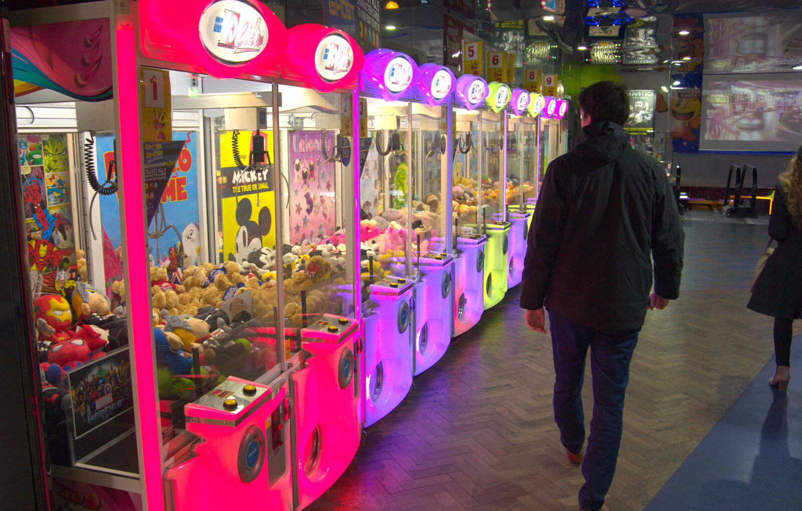 Ken wanders past a rank of claw machines from A Team Outing at Namco Funscape, South Bank, London - 27th March 2019