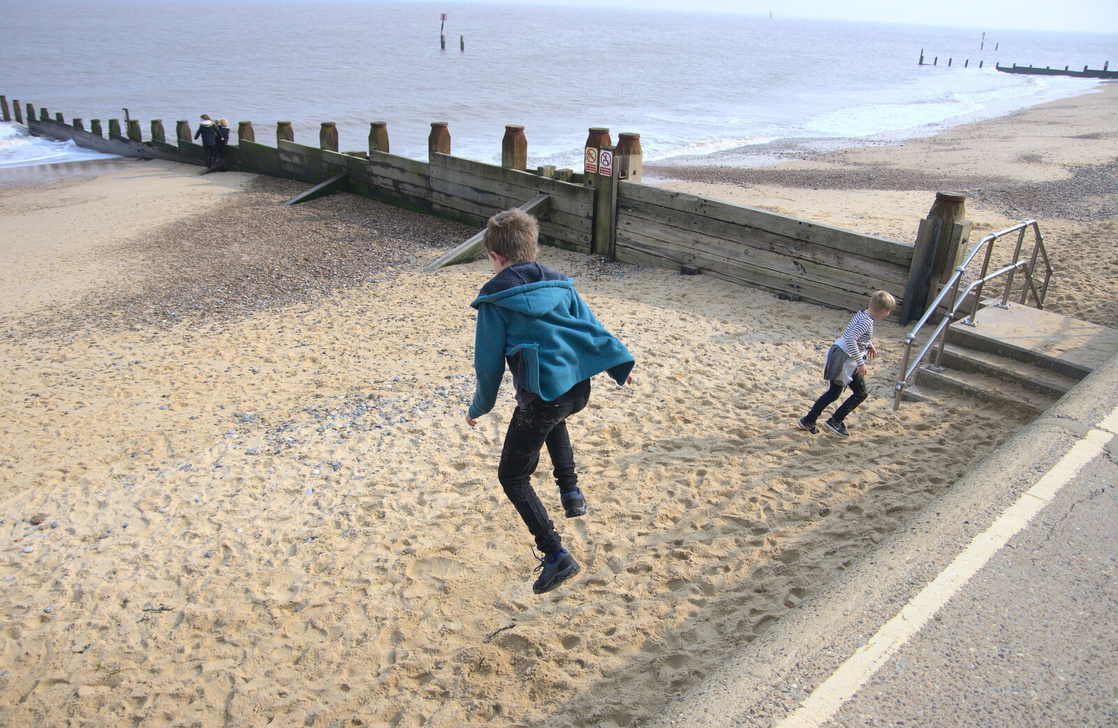 Fred leaps off another wall from On The Beach, Southwold, Suffolk - 7th April 2019