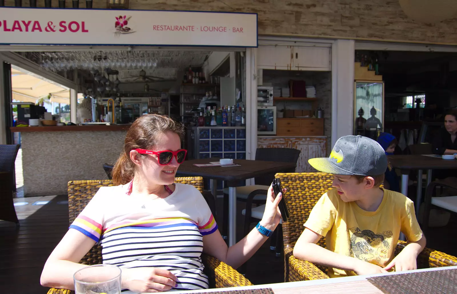 Isobel shows something on her phone, from A Holiday in Nerja, Andalusia, Spain - 15th April 2019