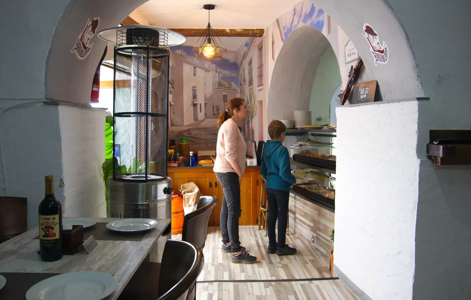 Isobel and Fred check out the tapas in Bandolero, from The Caves of Nerja, and Frigiliana, Andalusia, Spain - 18th April 2019