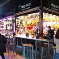 Isobel hangs around by a Jamón Ibérico market stall, A Walk up a Hill, Paella on the Beach and Granada, Andalusia, Spain - 19th April 2018