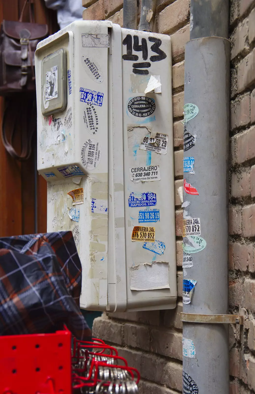 Stickers all over some street furniture, from A Walk up a Hill, Paella on the Beach and Granada, Andalusia, Spain - 19th April 2018