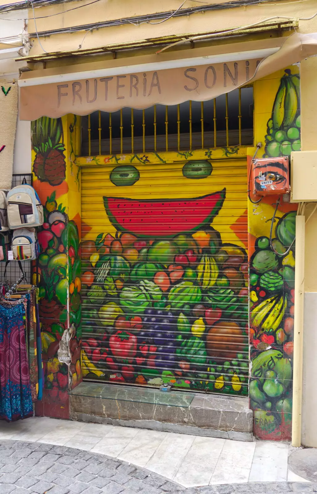 Fun graffiti on a fruit-shop shutter, from A Walk up a Hill, Paella on the Beach and Granada, Andalusia, Spain - 19th April 2018