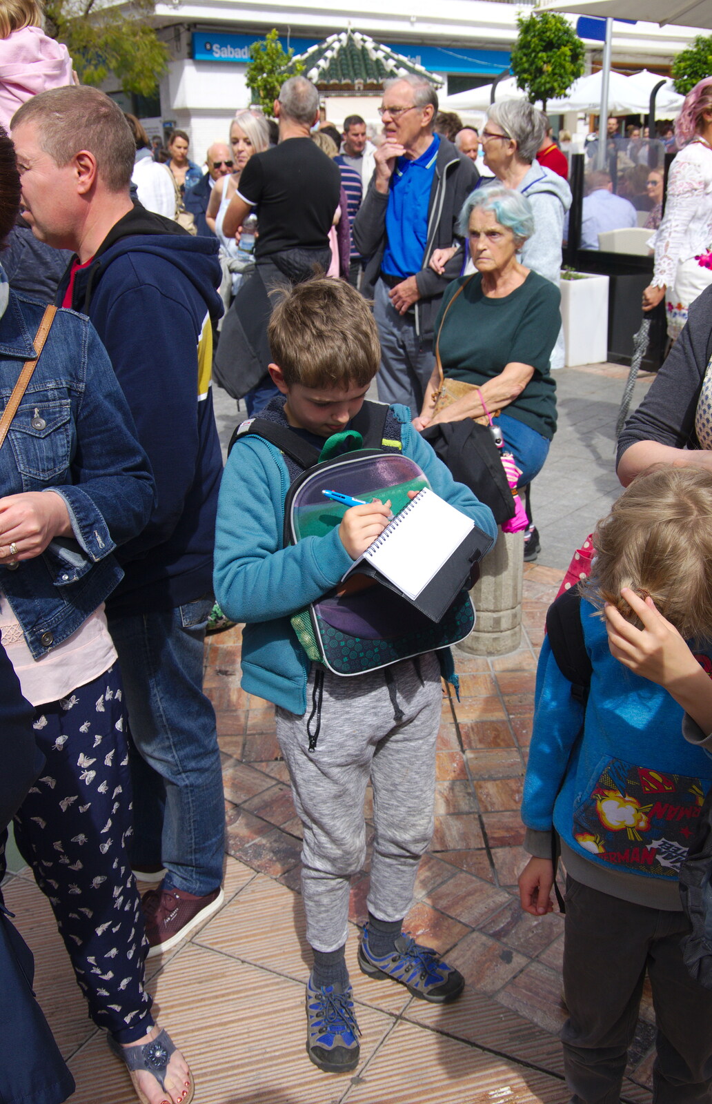 Fred takes some notes from An Easter Parade, Nerja, Andalusia, Spain - 21st April 2019