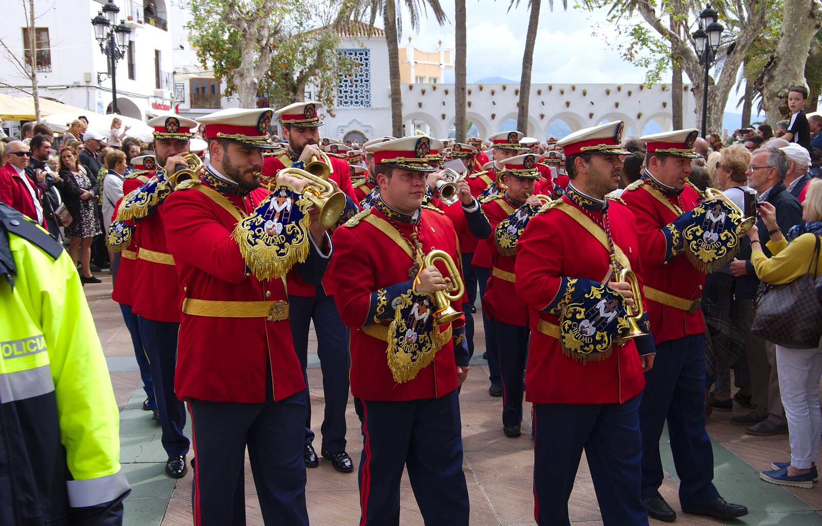 The bugle section marches past from An Easter Parade, Nerja, Andalusia, Spain - 21st April 2019