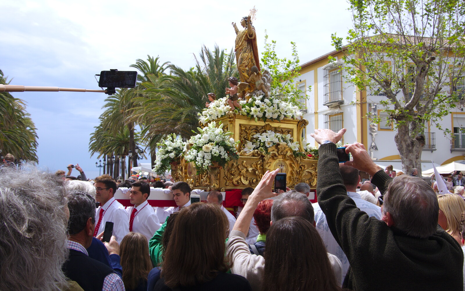There's even a phone on a selfie stick from An Easter Parade, Nerja, Andalusia, Spain - 21st April 2019