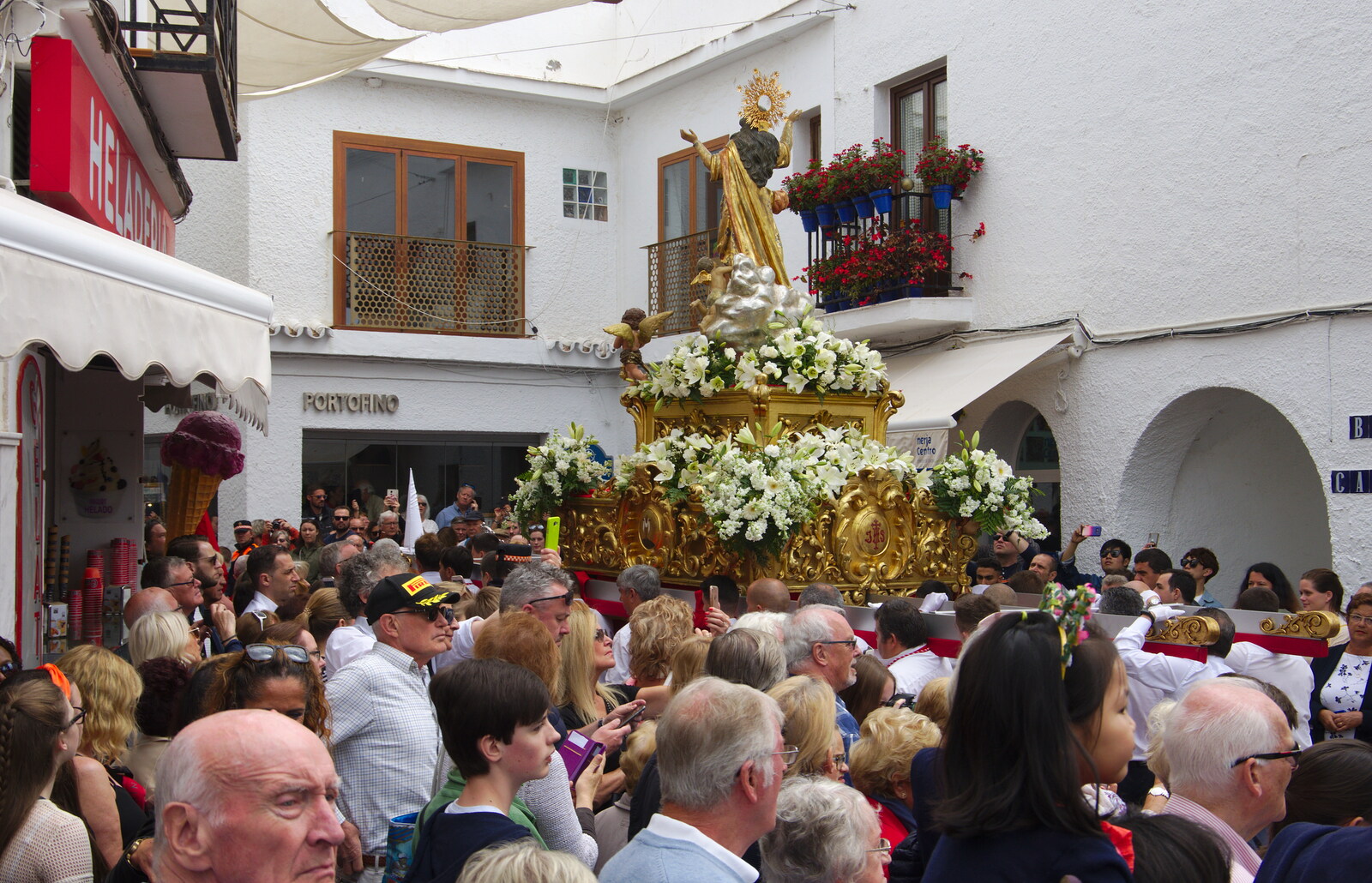 The final status heads off into the lanes from An Easter Parade, Nerja, Andalusia, Spain - 21st April 2019
