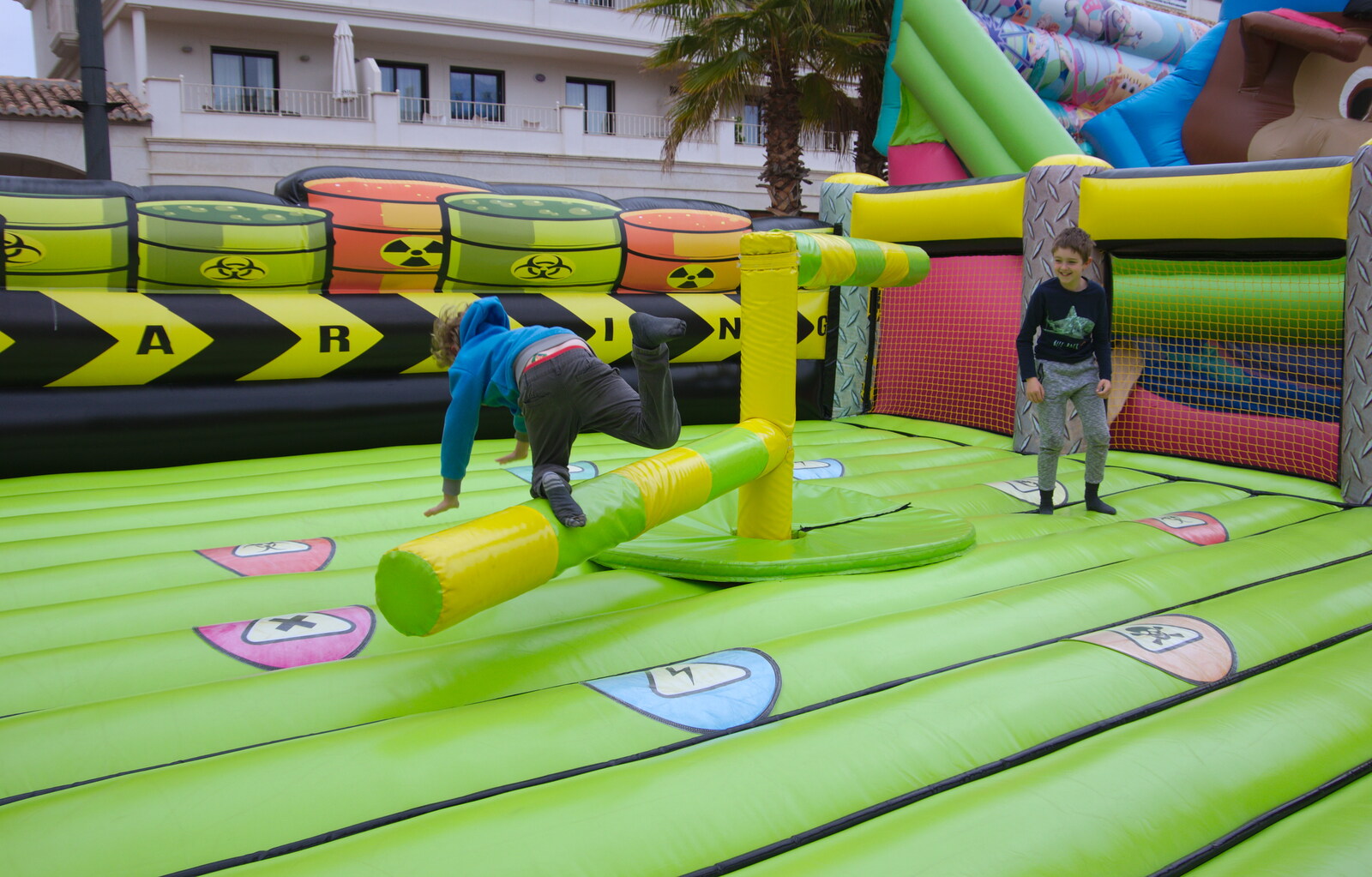 The boys mess around on a bouncy castle from An Easter Parade, Nerja, Andalusia, Spain - 21st April 2019