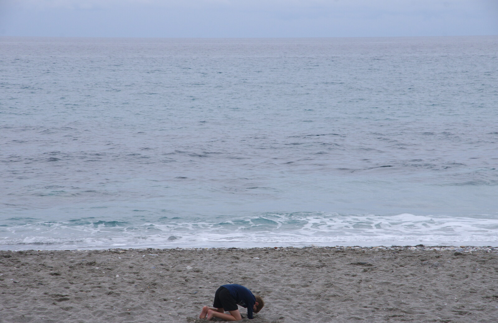 Fred digs another hole on the beach from An Easter Parade, Nerja, Andalusia, Spain - 21st April 2019