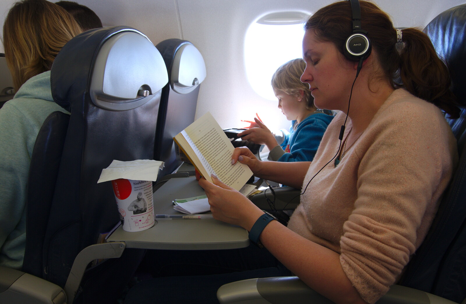 Isobel reads a book on the plane from An Easter Parade, Nerja, Andalusia, Spain - 21st April 2019