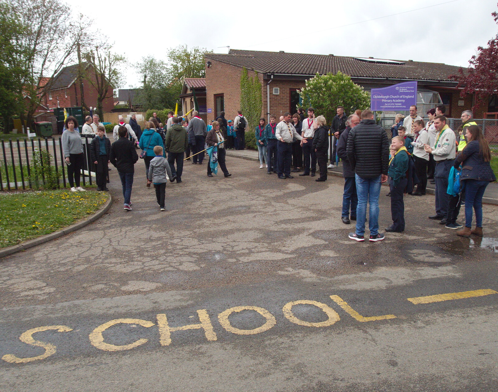 People assemble at the school from A St. George's Day Parade, Dickleburgh, Norfolk - 28th April 2019