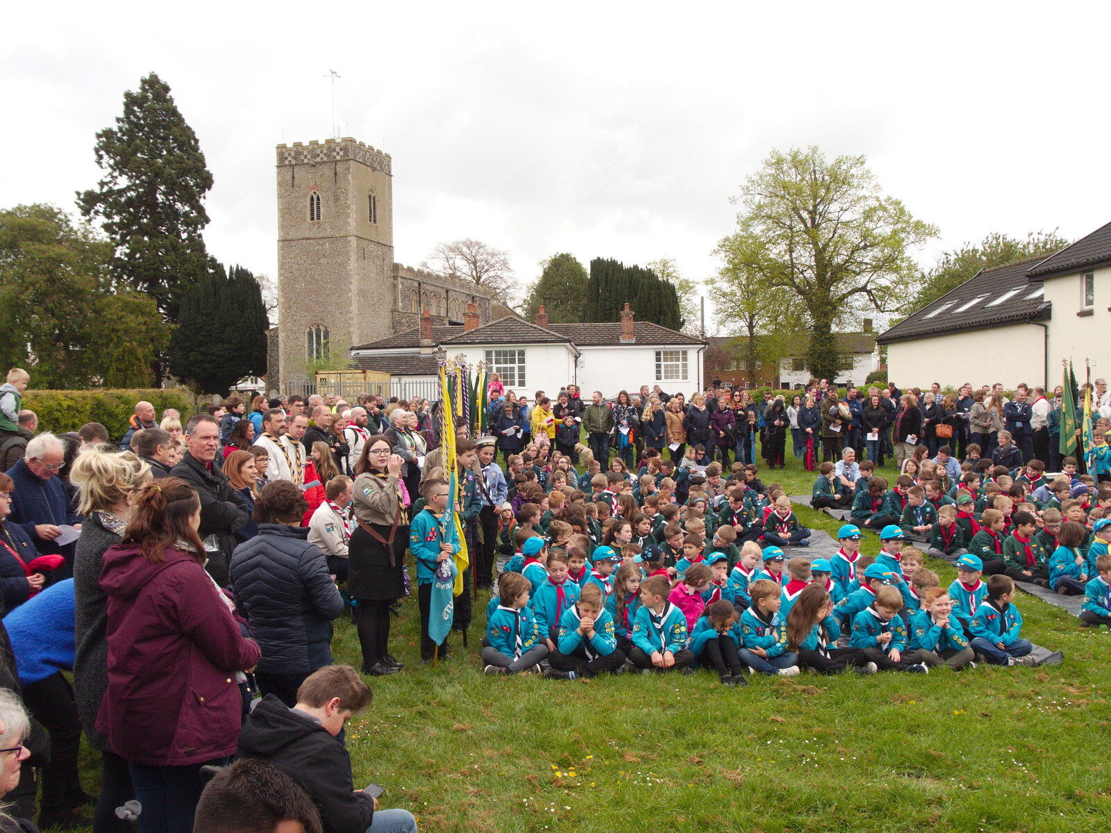 The massed crowds behind the church in Dickleburgh from A St. George's Day Parade, Dickleburgh, Norfolk - 28th April 2019